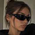 The Apex Sunglasses in jet black worn, side profile